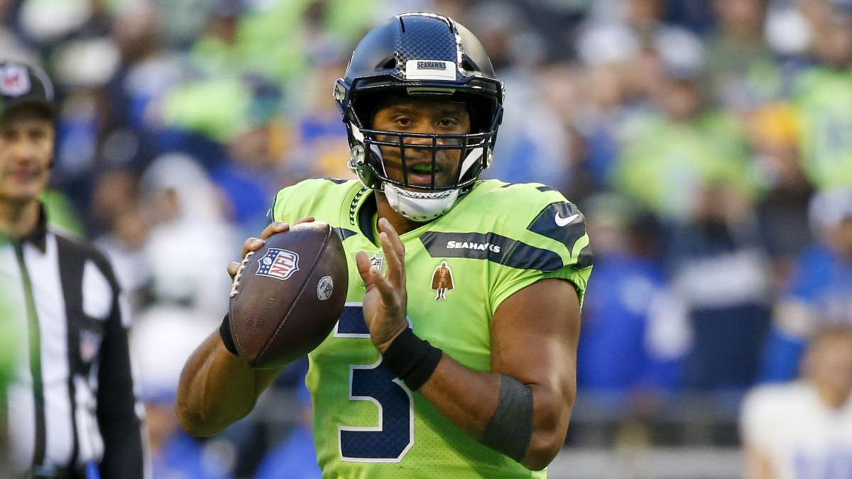 Seattle Seahawks quarterback Russell Wilson (3) looks to pass against the Los Angeles Rams during the second quarter at Lumen Field.